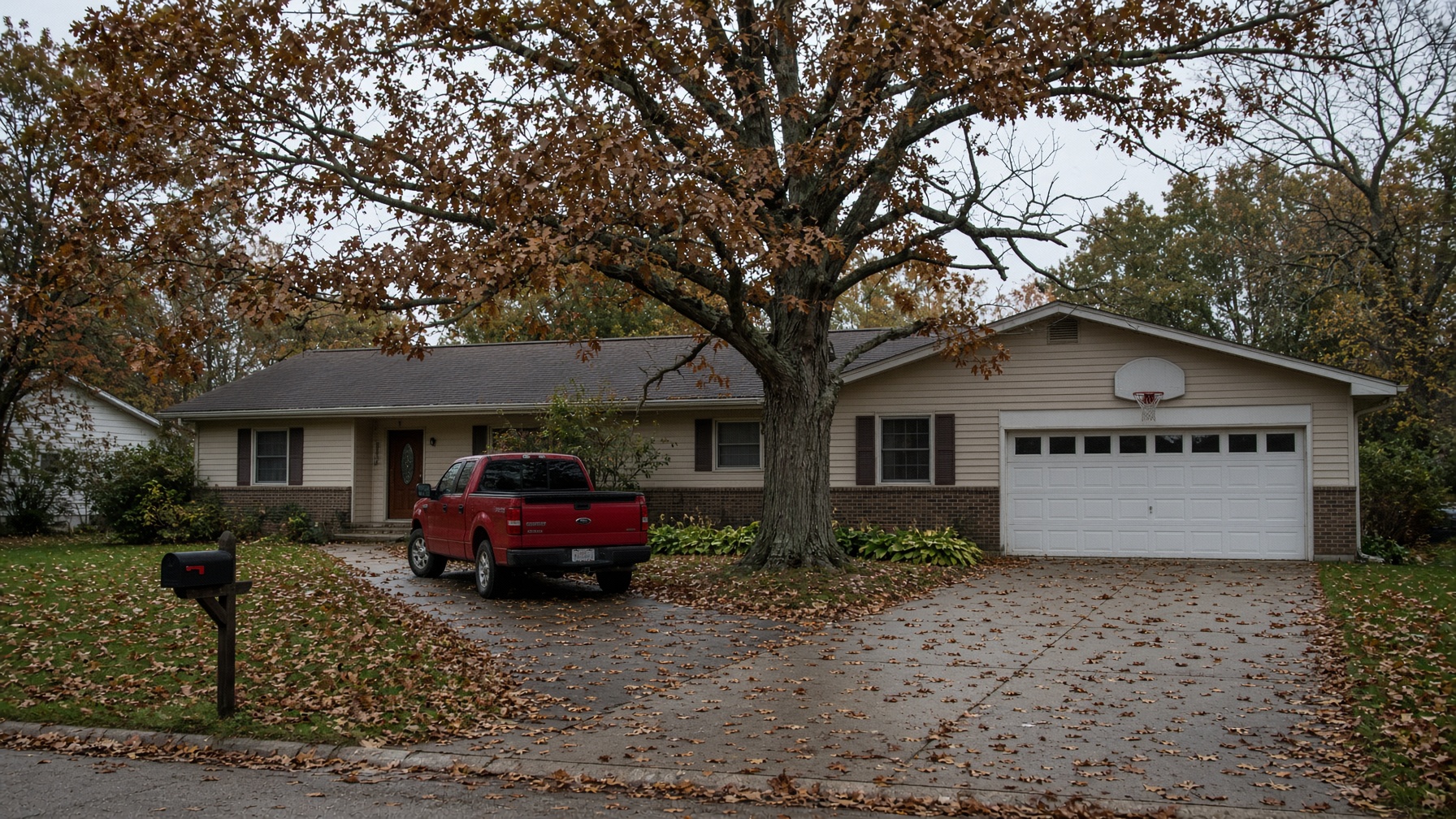 Same Allouez ranch with a hazard oak over the garage